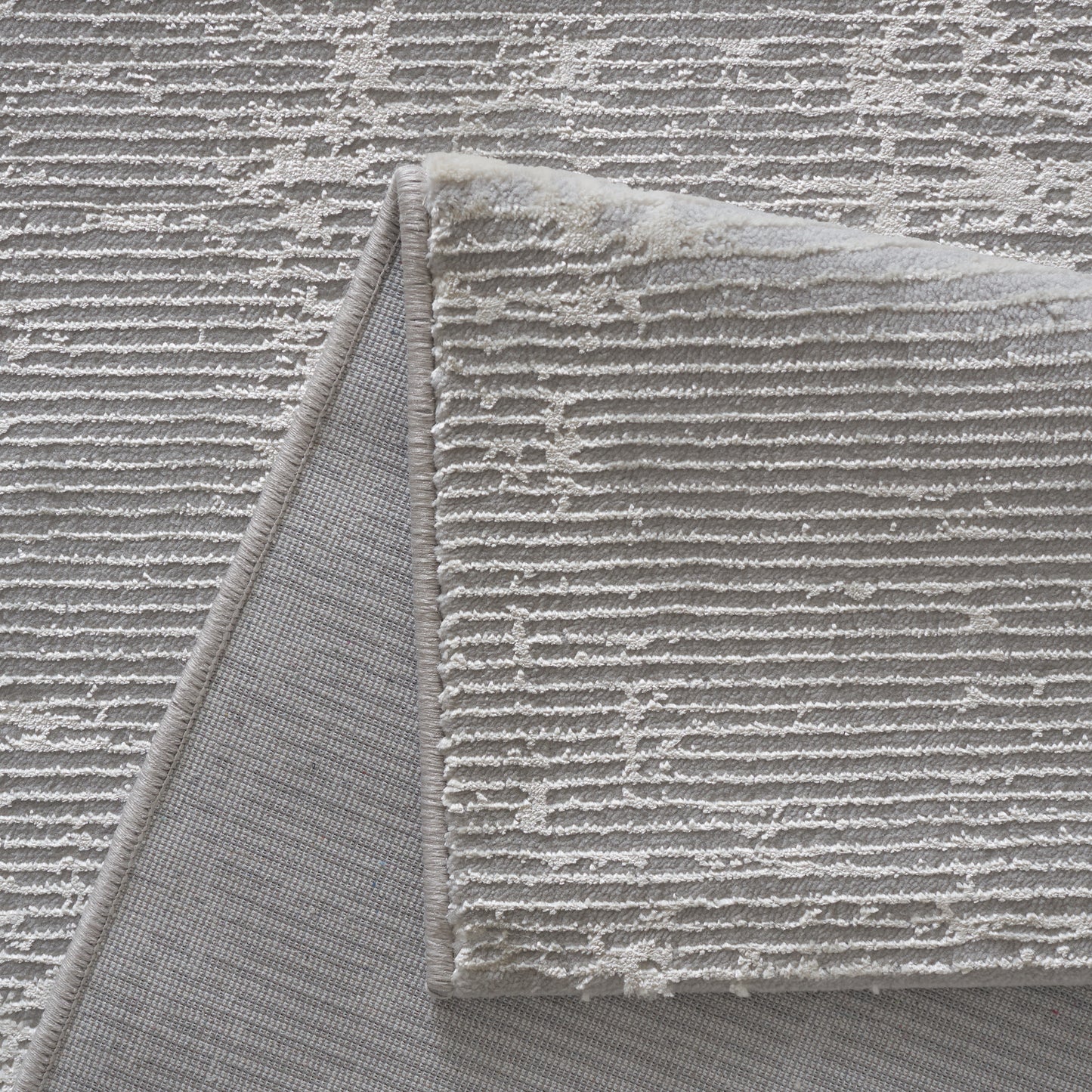Tapis moderne gris clair et écru texturé – ELIZA 7110